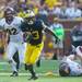 Michigan wide receiver Dennis Norfleet runs the ball during the third quarter of their game against Central Michigan, Saturday, Aug, 31.
Courtney Sacco I AnnArbor.com  